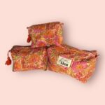 Toilettas oranje kleurrijke set met bloemenprint