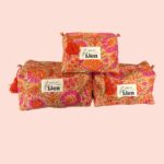 Toilettas Oranje met kleurrijke Bloemenprint